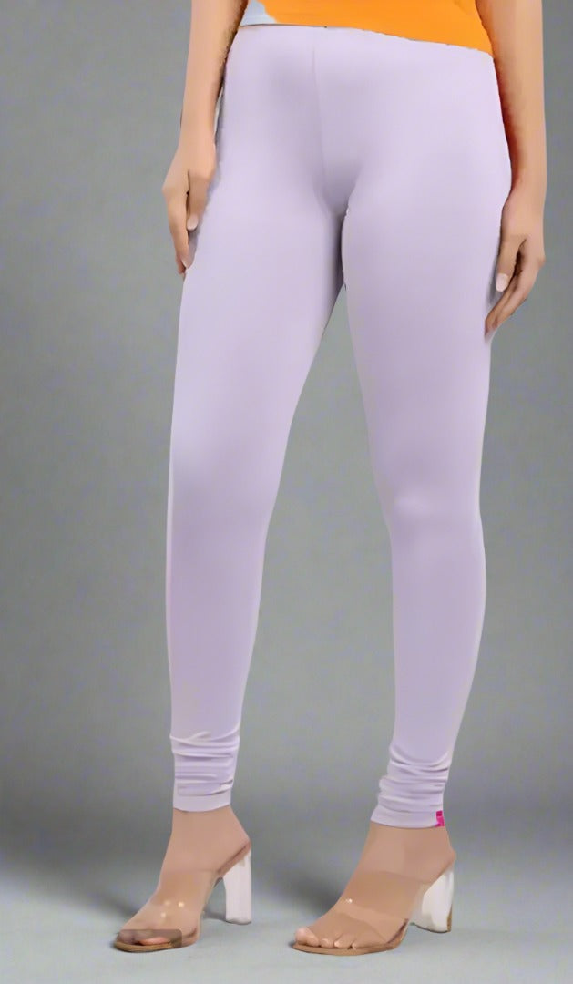 Enhance your wardrobe with our stylish and comfortable Polyester Solid Leggings for women. Made with modern influences, these leggings offer a cool and chic look, while providing maximum comfort. Perfect for any occasion, these leggings are a must-have for the fashion-forward woman.